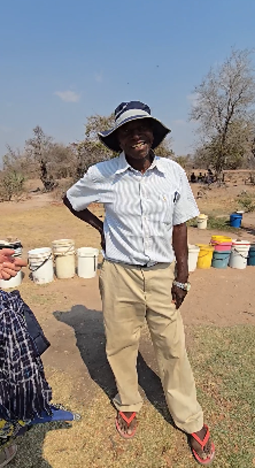 A portrait shot of village head, Moses B. Mugombe.